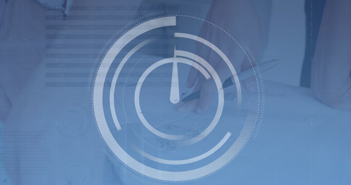 Image of processing circles and binary code over hands of biracial man using laptop