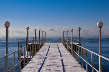 Naklejka premium pier, water, sea, bridge, beach, sky, ocean, lake, jetty, landscape, sunset, wooden, dock, wood, nature, coast, clouds, walkway, summer, horizon, seascape, footbridge, travel, island, boat