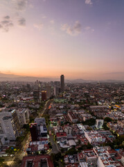Fototapeta na wymiar Beautiful aerial view of the capital of Mexico city of Mexico City at sunset.