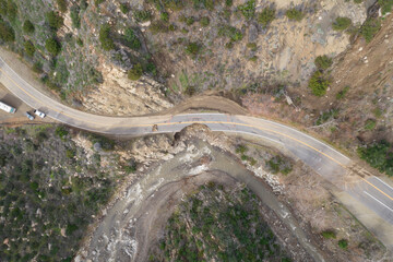 Broken Highway road damaged Destroyed Flooded River, Ojai, California, Ventura River disaster Rain Storm Aerial
