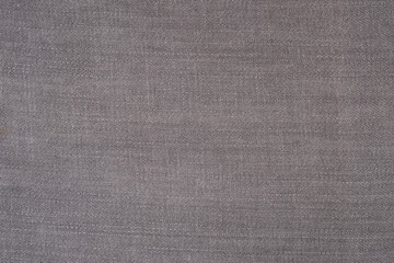Fototapeta na wymiar Black and grey denim background. Detailed texture of black and grey denim fabric