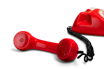 Answering an old fashioned red telephone handset