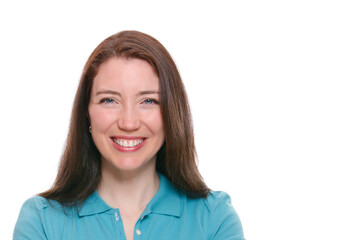 Attractive young woman smiling at camera with white background.
