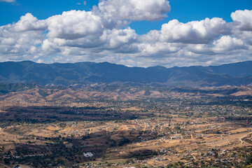 Beautiful view of the large Mexican city of Oaxaca from Monte Alban. View of the endless mountain peaks.