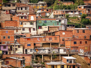 The comuna 13 neighborhood in Medellin, Colombia has transformed from a former ghetto to a...