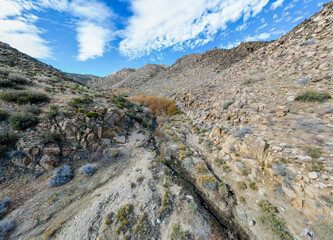 Rugged Desert Mountains on a Blue Sky Day with a Valley