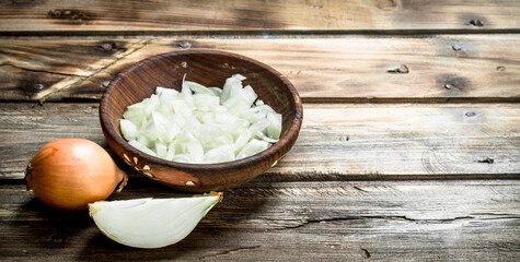 Fototapeta na wymiar Chopped onions in a bowl.