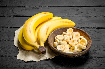 Bananas on grey paper.