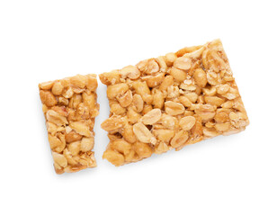 Pieces of tasty peanut bar (kozinaki) isolated on white, top view