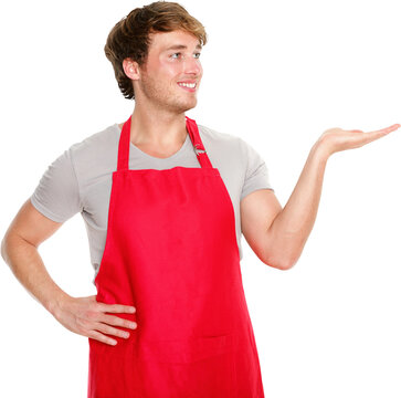 Apron man showing. Small business shop owner showing and looking wearing red apron. Happy smiling and proud Caucasian man presenting isolated in transparent PNG.