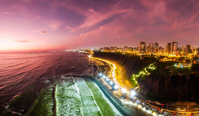 Costa Verde of Lima after sunset shot by drone panorama (Miraflores by night)