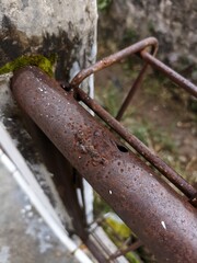 rusty iron and mossy walls