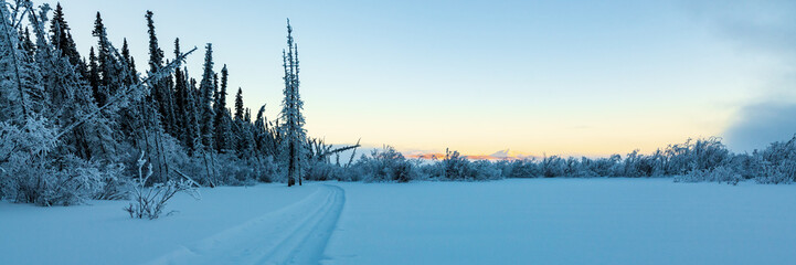 Stunning winter views along the Yukon River near Whitehorse with panoramic view at sunset and...