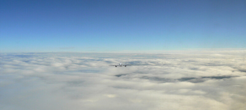 3D rendering aeroplane above the clouds