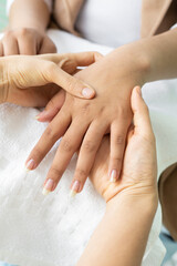 Obraz na płótnie Canvas healthcare professional doing hand massage, spa beauty treatment, lifestyle and body parts