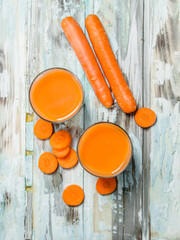Carrot juice in a glass Cup.