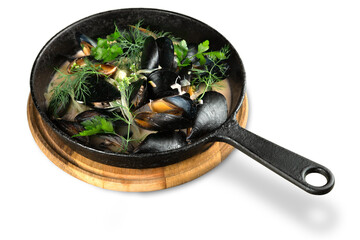 Copper pot of gourmet mussels served on a napkin garnished with fresh herbs for a tasty seafood meal