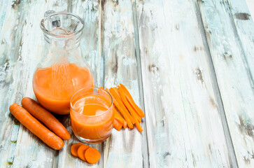 Carrot juice in the jug.