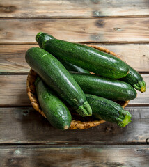 Fresh zucchini in the basket.