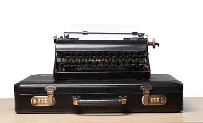 Antique old vintage retro typewriter on suitcase