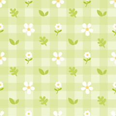 floral and leaf seamless pattern design with green checkered background suitable for fabric, wallpaper, home decor