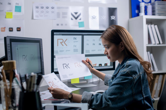 Asian woman graphic designer working in office. Artist creative designer illustrator graphic skill concept.