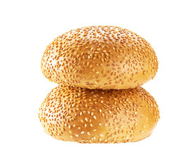 Two hamburger buns with sesame seeds isolated on white background.