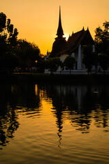Fototapeta na wymiar silhouette of Wat Temple beautiful temple in the historical park Thailand