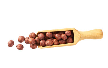 Pile of shelled hazelnut kernels in wooden scoop on white background. Top view.