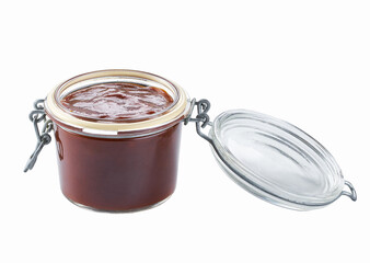 barbecue sauce in a glass jar isolated on white background.