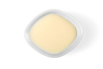 Fresh cream and sauce in bowl
