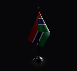 Small national flag of the Gambia on a black background