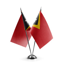 Small national flags of the East Timor on a white background