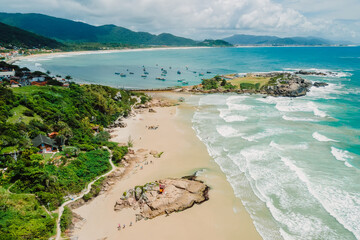 Coastline with beach and Atlantic ocean in Brazil. Aerial view of Matadeiro Beach in Florianopolis