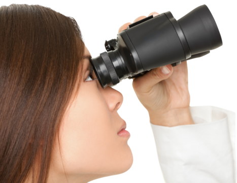 Closeup of young businesswoman looking through binoculars over white background. business woman in suit isolated in transparent PNG. - Powered by Adobe