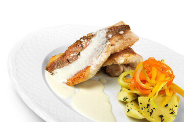 Grilled salmon and vegetables with sauce