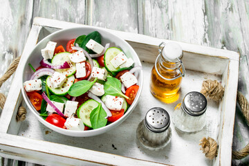 Vegetable salad. Salad with vegetables, cheese and olive oil.