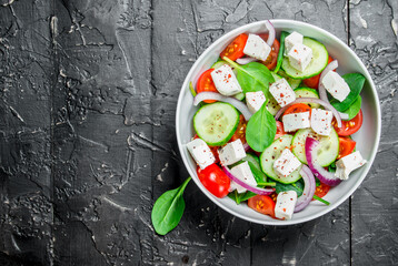 Vegetable salad. Salad with vegetables, cheese and olive oil.