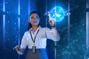 Female Technician touching on digital globe screen, future technology concept