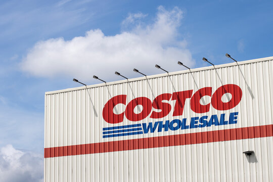 Tigard, OR, USA - May 25, 2022: Costco logo is seen at its store in Tigard, Oregon. Costco Wholesale Corporation operates a chain of membership-only big-box retail stores (warehouse club).