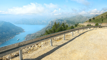Fototapeta na wymiar Beautiful view from the road in the mountains to the Bay of Kotor. Fjord of Montenegro.