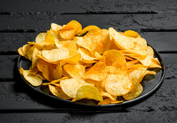 Potato chips on the plate.