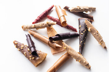 Fruit pastille isolated on a white background. Fruit roll-ups made from raspberry, apples, orange and currant.