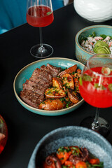 Served with food and drinks table in restaurant, nobody
