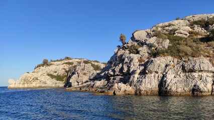 Fototapeta premium Rock cliffs near the town of Kolymbia, Rhodes island, Greece.