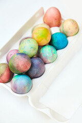 Easter painted eggs folded in plastic container