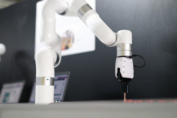 Robotic arm and mechanical hand manipulator closeup