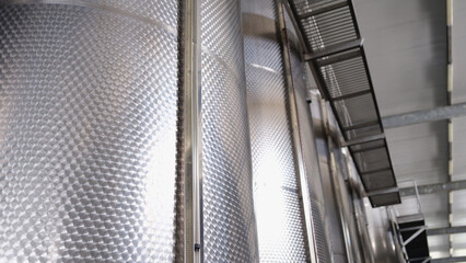 Obraz premium Lots of stainless steel tanks modern winery production