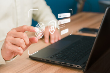 Man login with fingerprint scanning technology in the computer. Secure encryption and access to the user's private information to access the Internet.