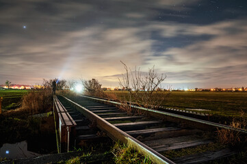 Fototapeta na wymiar Railway at the starry night